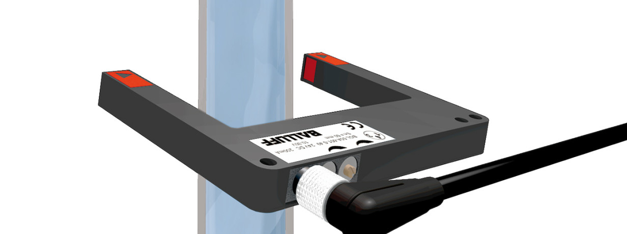 Reliable detection of levels through transparent container walls using the fork sensor